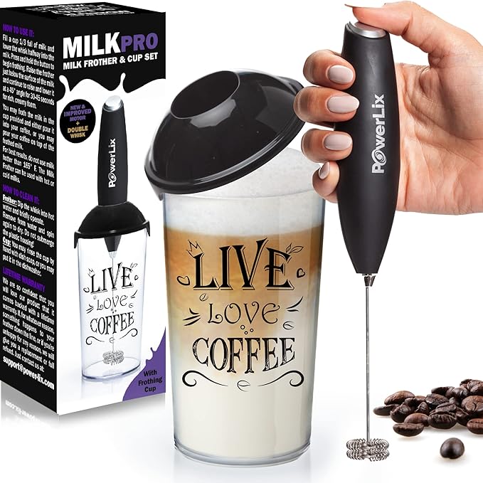 PowerLix handheld battery-operated milk frother resting on its stand next to a cup of coffee